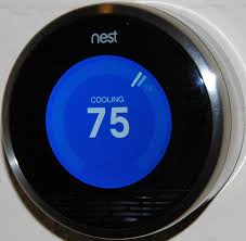 A smart thermostat set to cooling